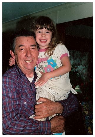 1989 - Rob with first grandchild Kate.jpg